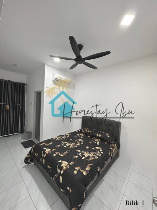 Homestay Ibu Лумут Экстерьер фото