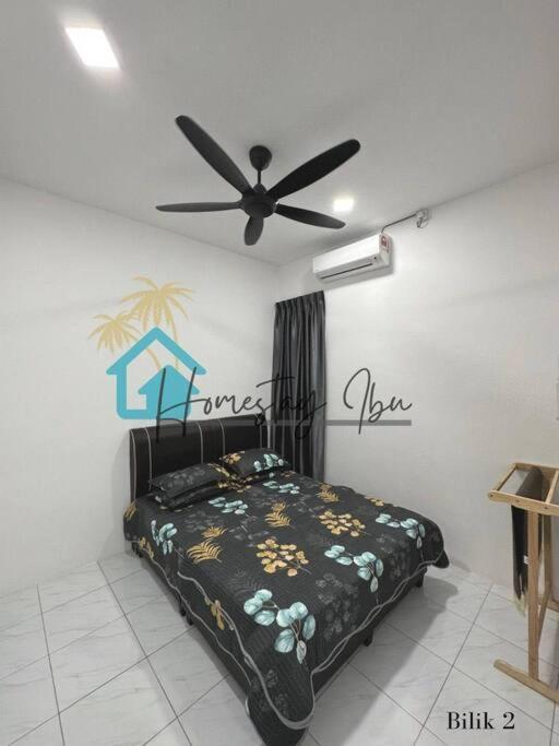 Homestay Ibu Лумут Экстерьер фото